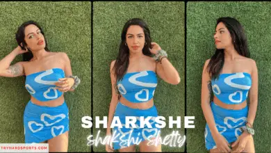 Sharkshe in blue top and skirt